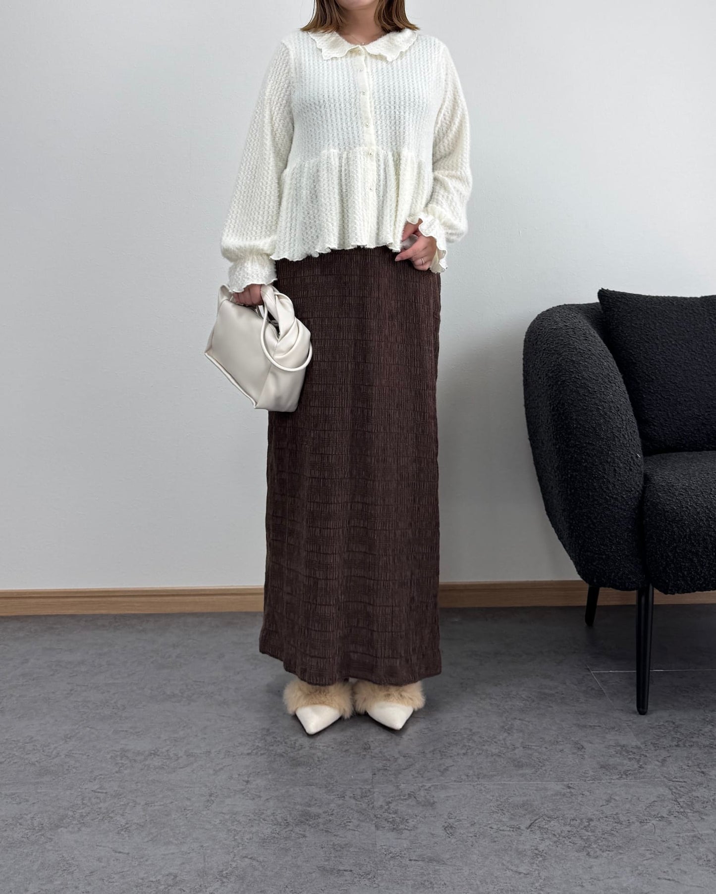 フェザー風ペプラムブラウス