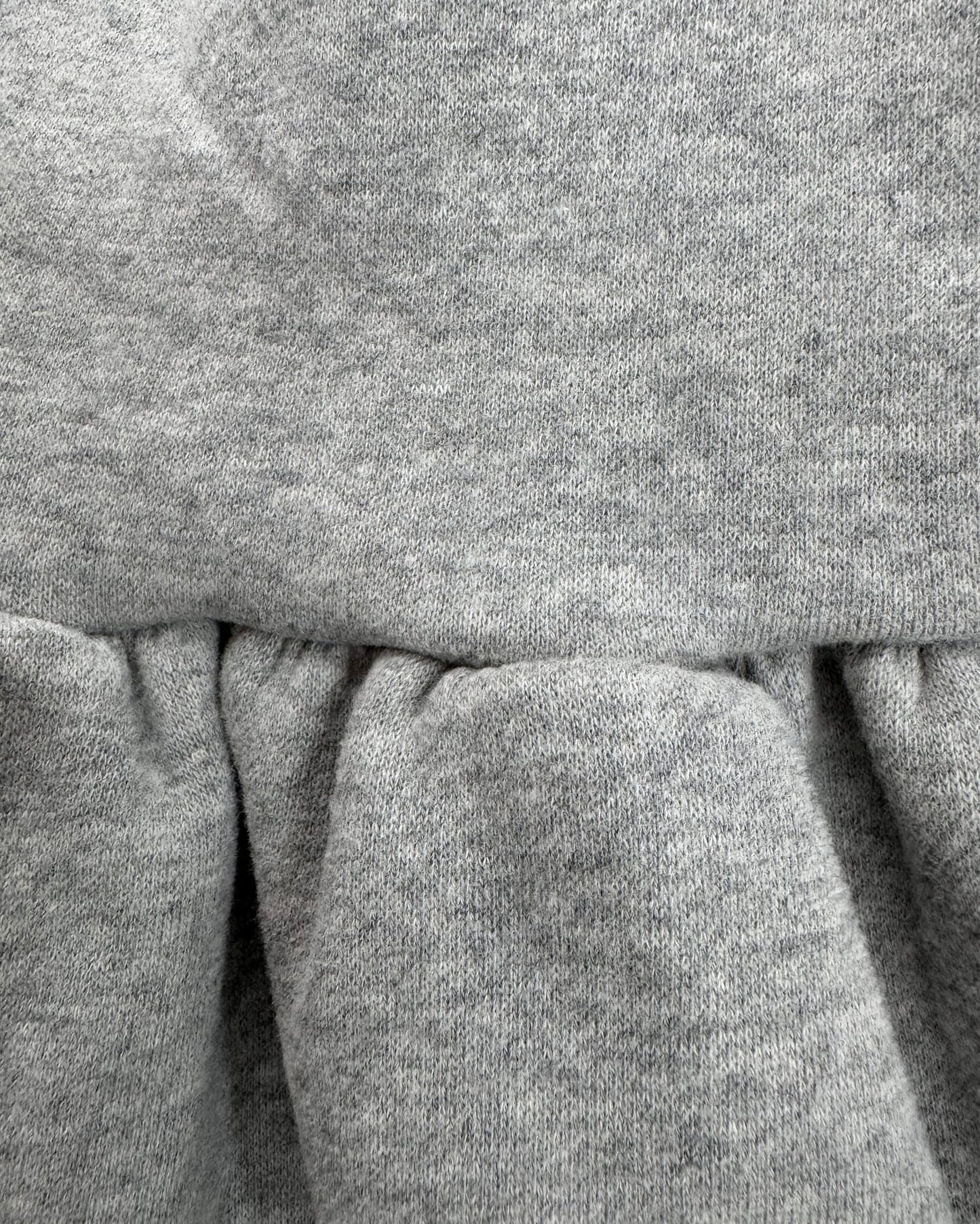 裾フリルトレーナー