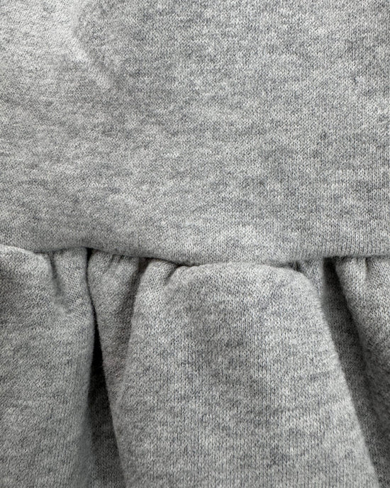 裾フリルトレーナー