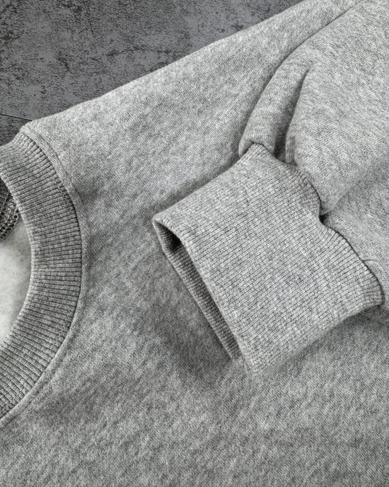 裾フリルトレーナー