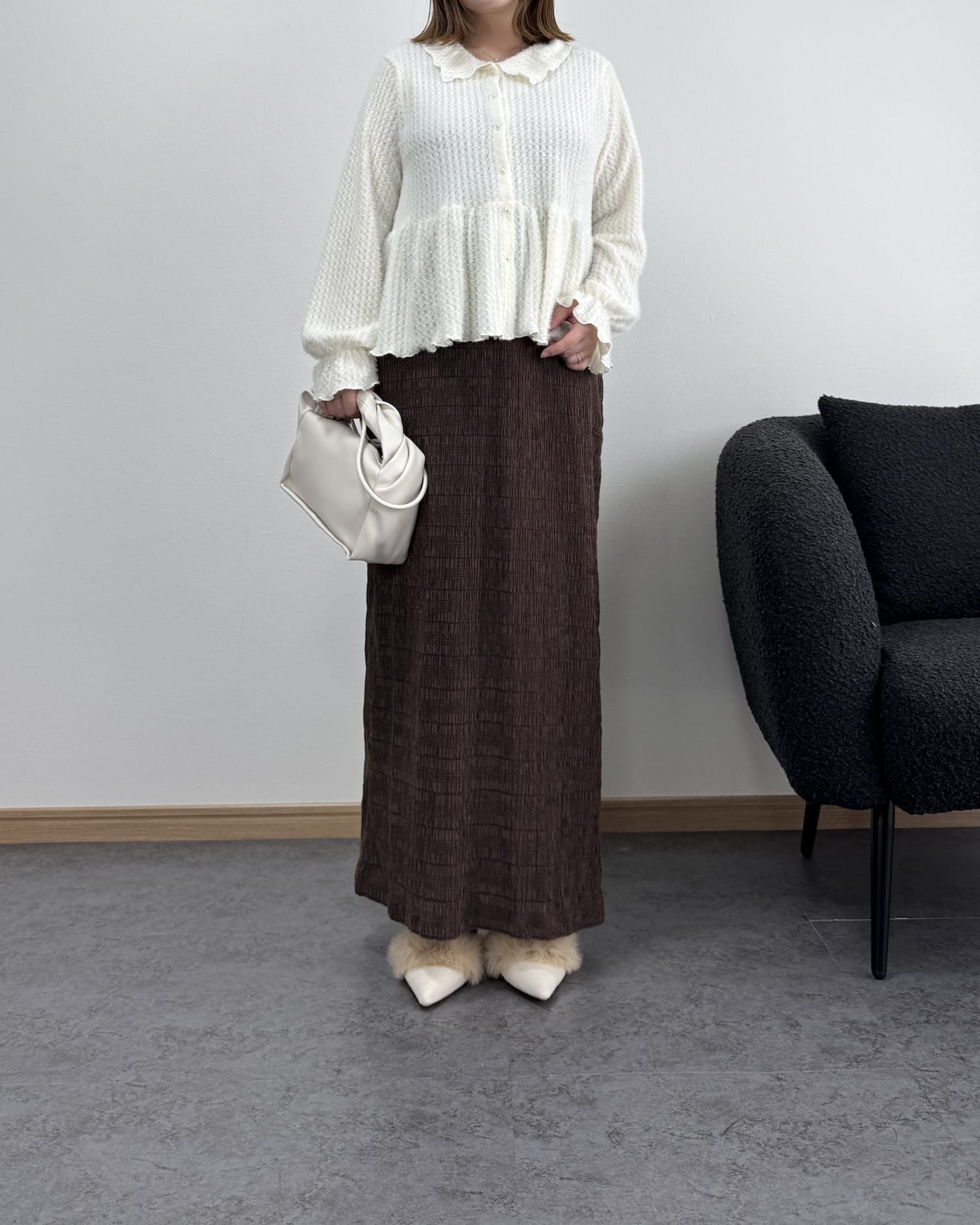 フェザー風ペプラムブラウス