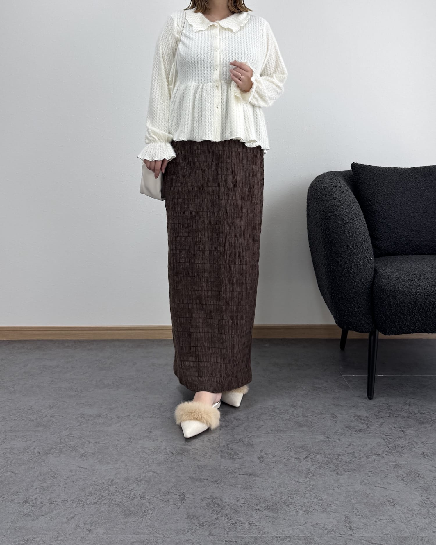 フェザー風ペプラムブラウス