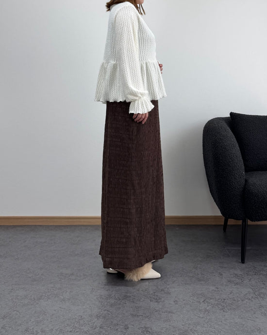 フェザー風ペプラムブラウス