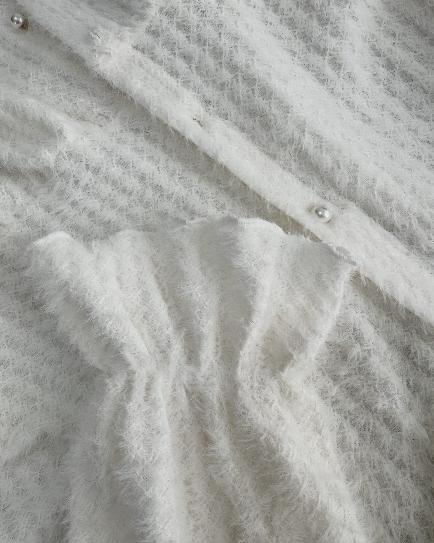 フェザー風ペプラムブラウス